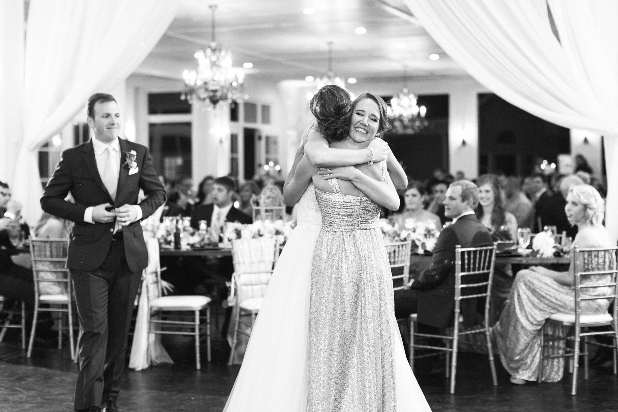 Maid of Honor gives toast at elegant reception.