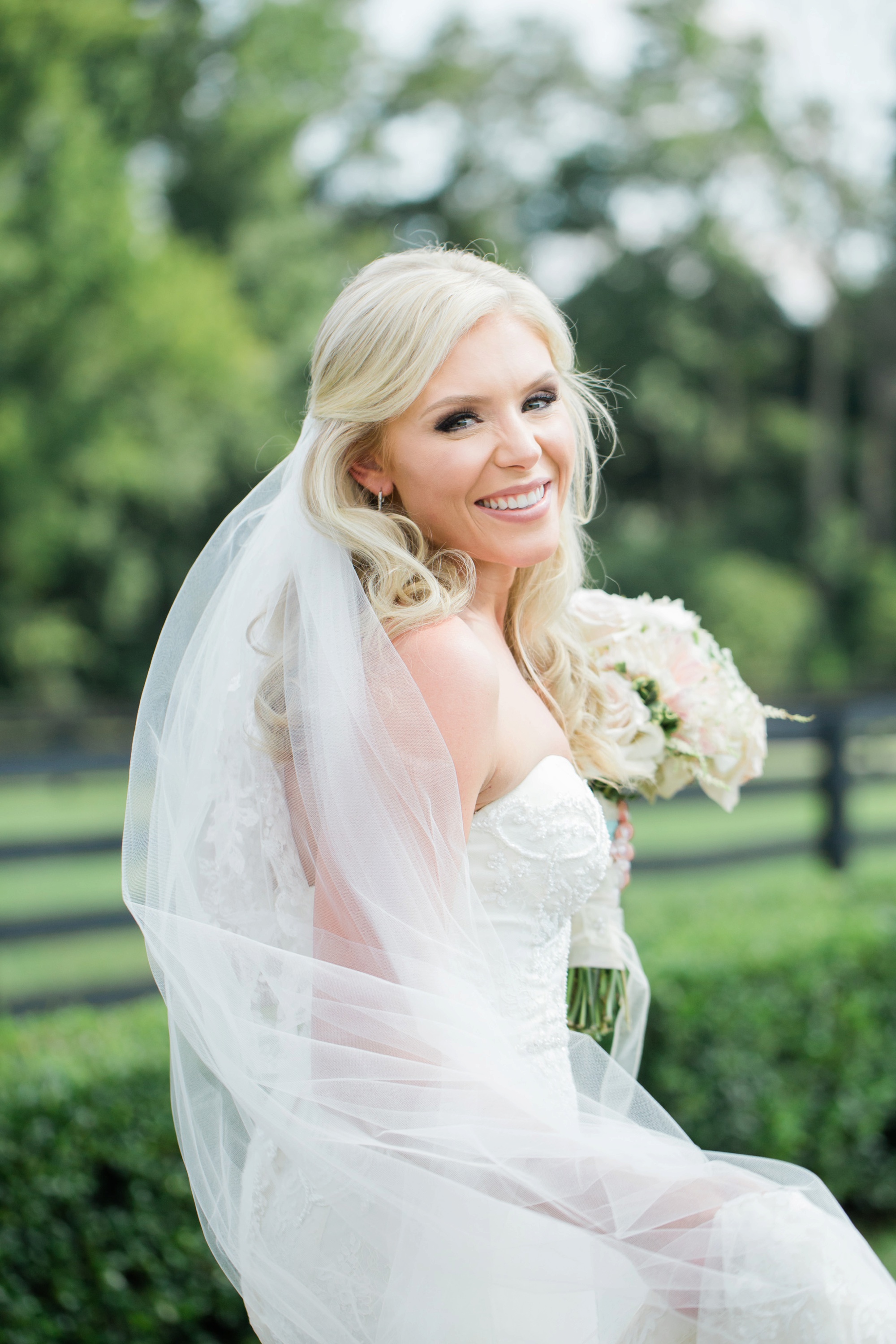 This bridal portrait is nothing but pure joy in a photo. I don't think I've come across a bride so excited about wedding photography. Photo by luxury destination wedding photographer Rebecca Cerasani