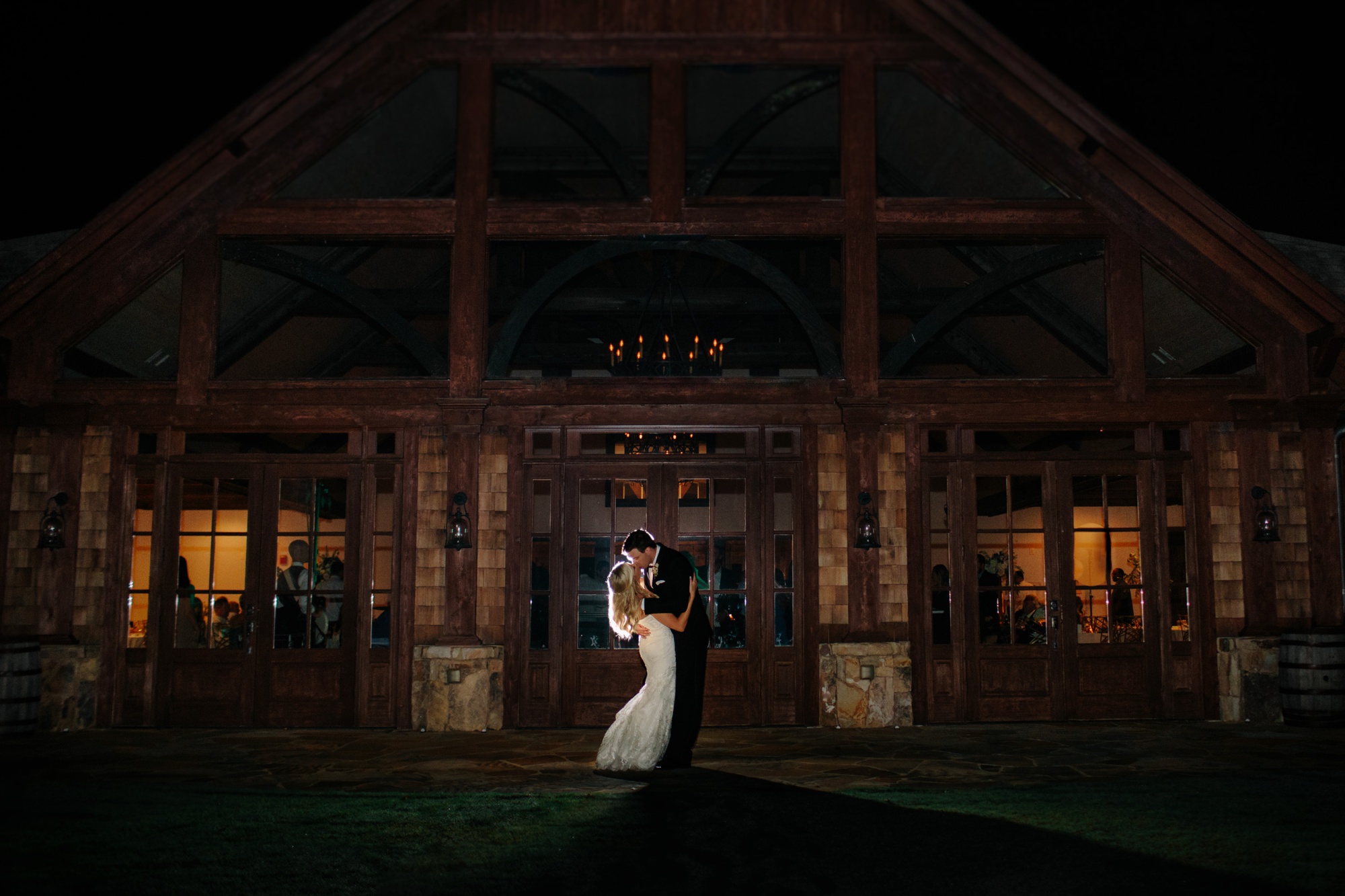 A night shot in front of your wedding venue is one photo not to miss! Get yours with luxury destination wedding photographer Rebecca Cerasani.
