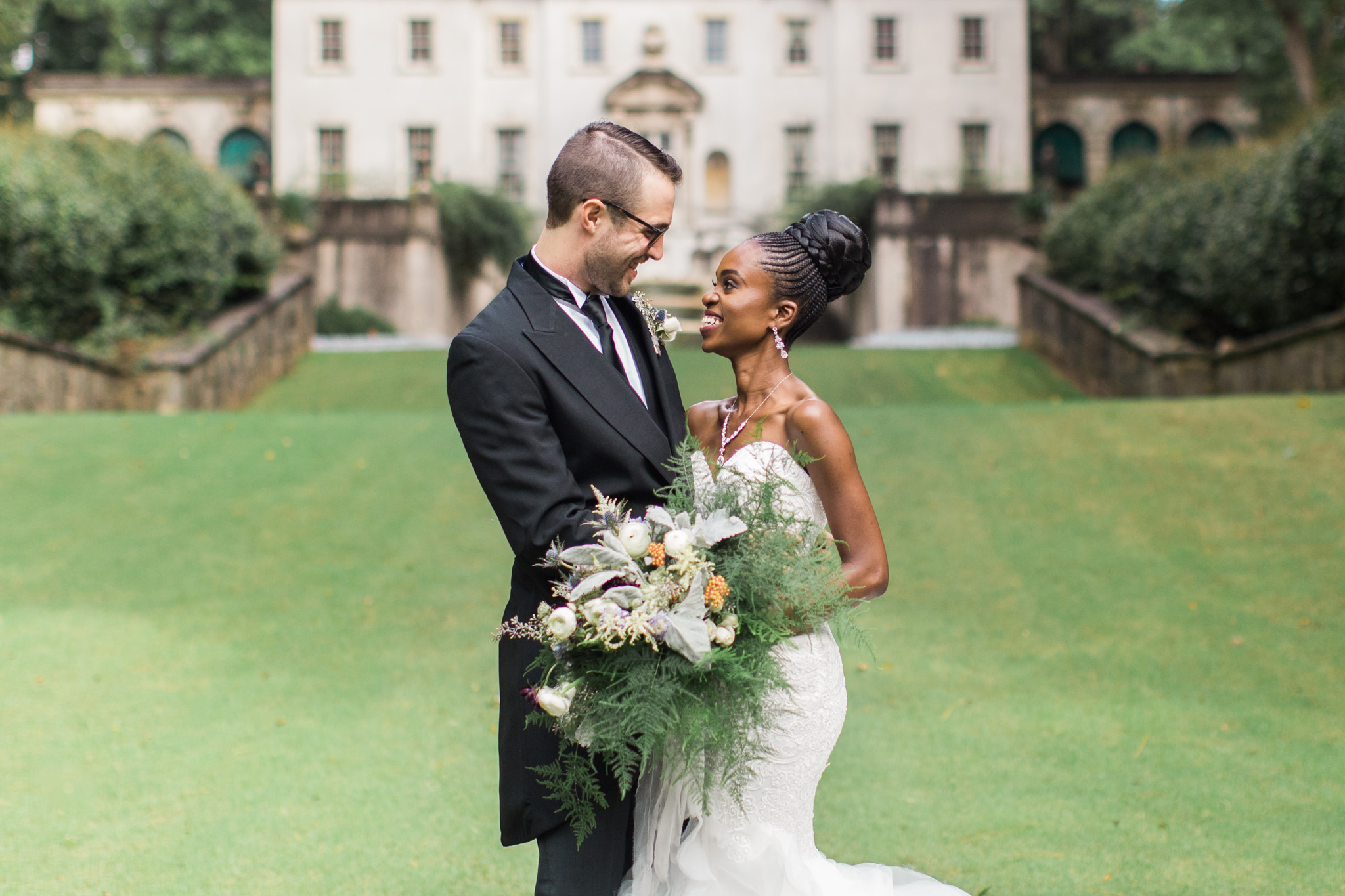 Rebecca Cerasani, Atlanta's premier luxury wedding photographer, captures a joyful bride and groom after their first look