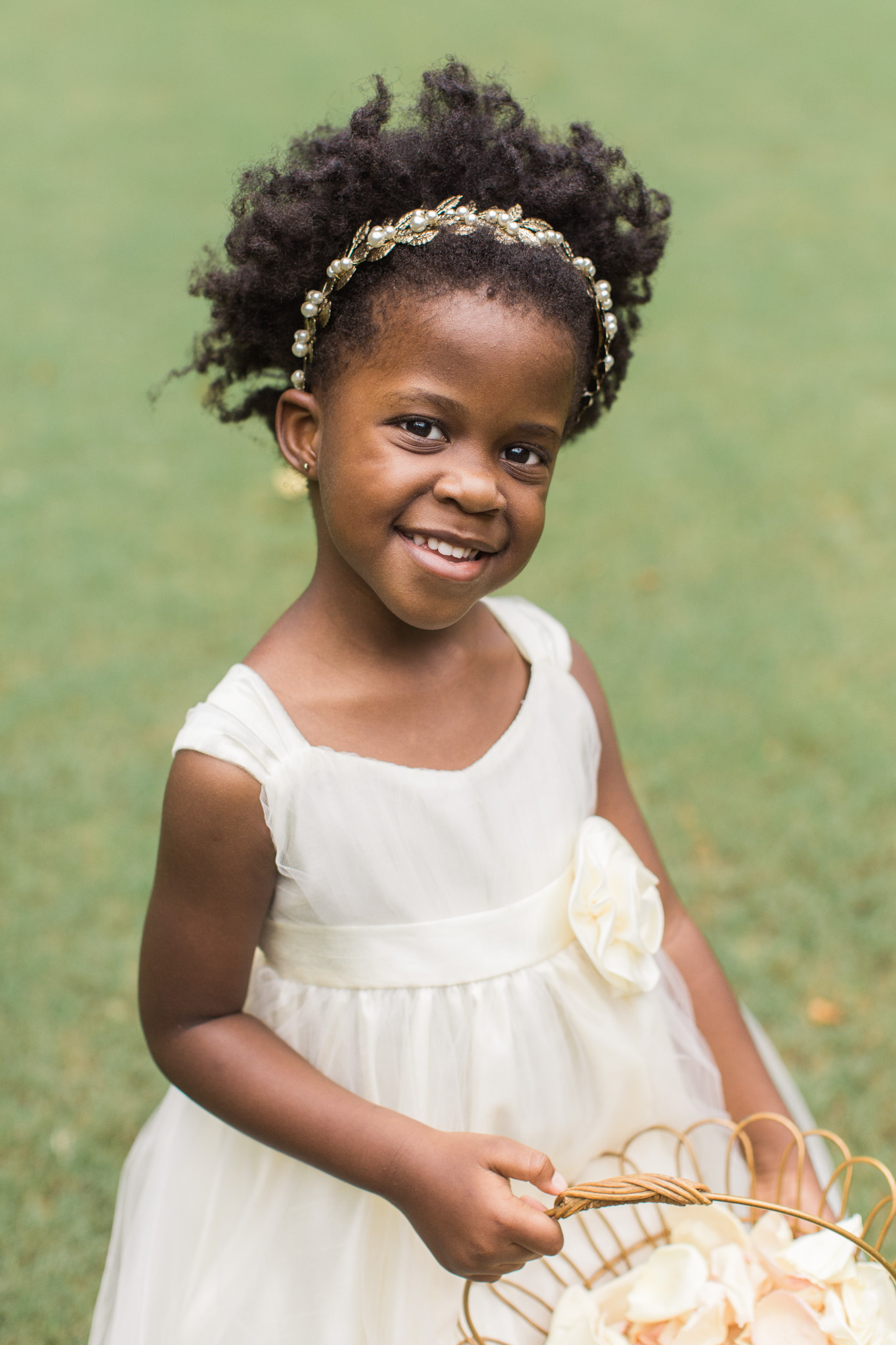 Flower girl dress and hairstyle captured by Swan House photographer Rebecca Cerasani