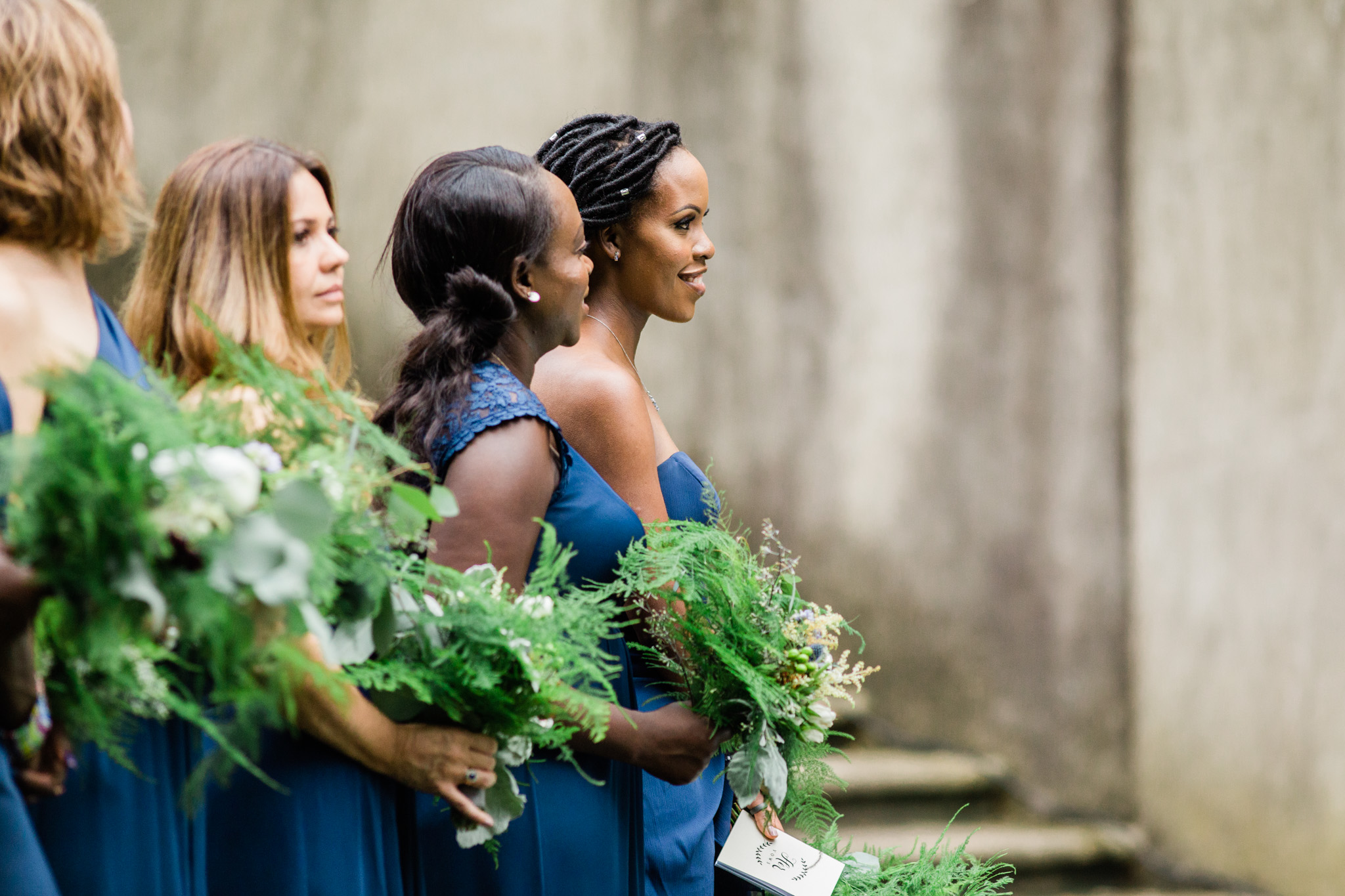 Bridesmaids look on as their friend and sister gets married at the Swan House. Photo by Atlanta's Premier wedding photographer Rebecca Cerasani