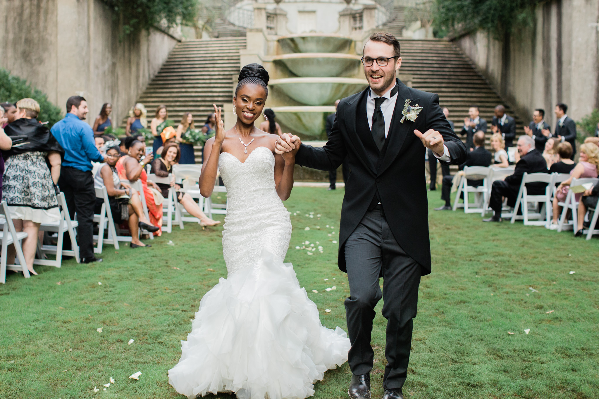 Rebecca Cerasani captures this joyful Swan House bride and groom as the leave husband and wife.