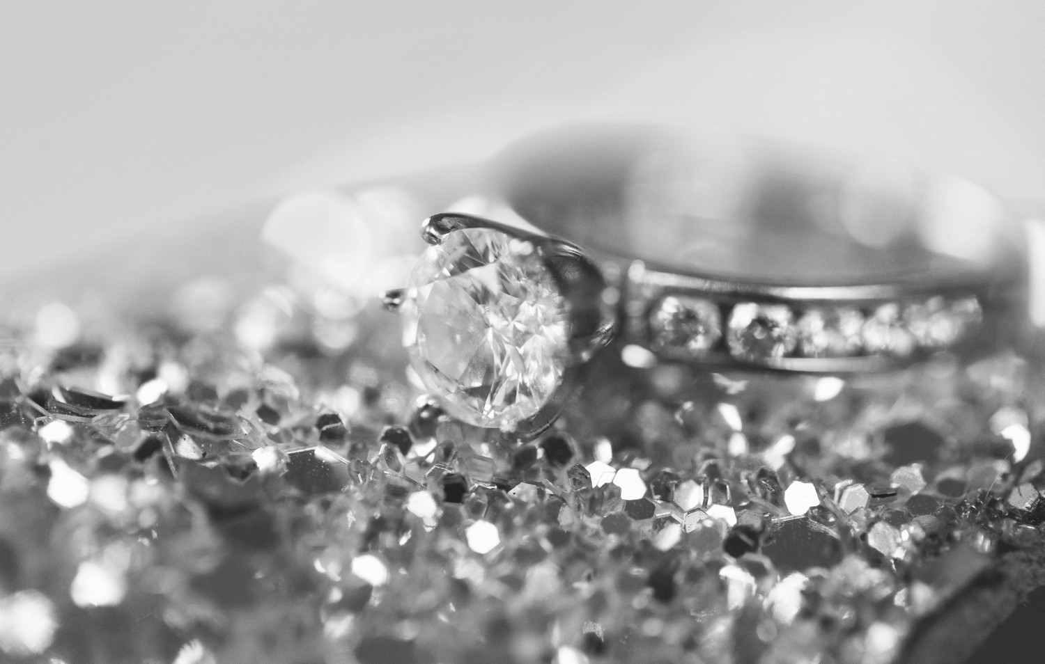 Black and white sparkly engagement ring shot