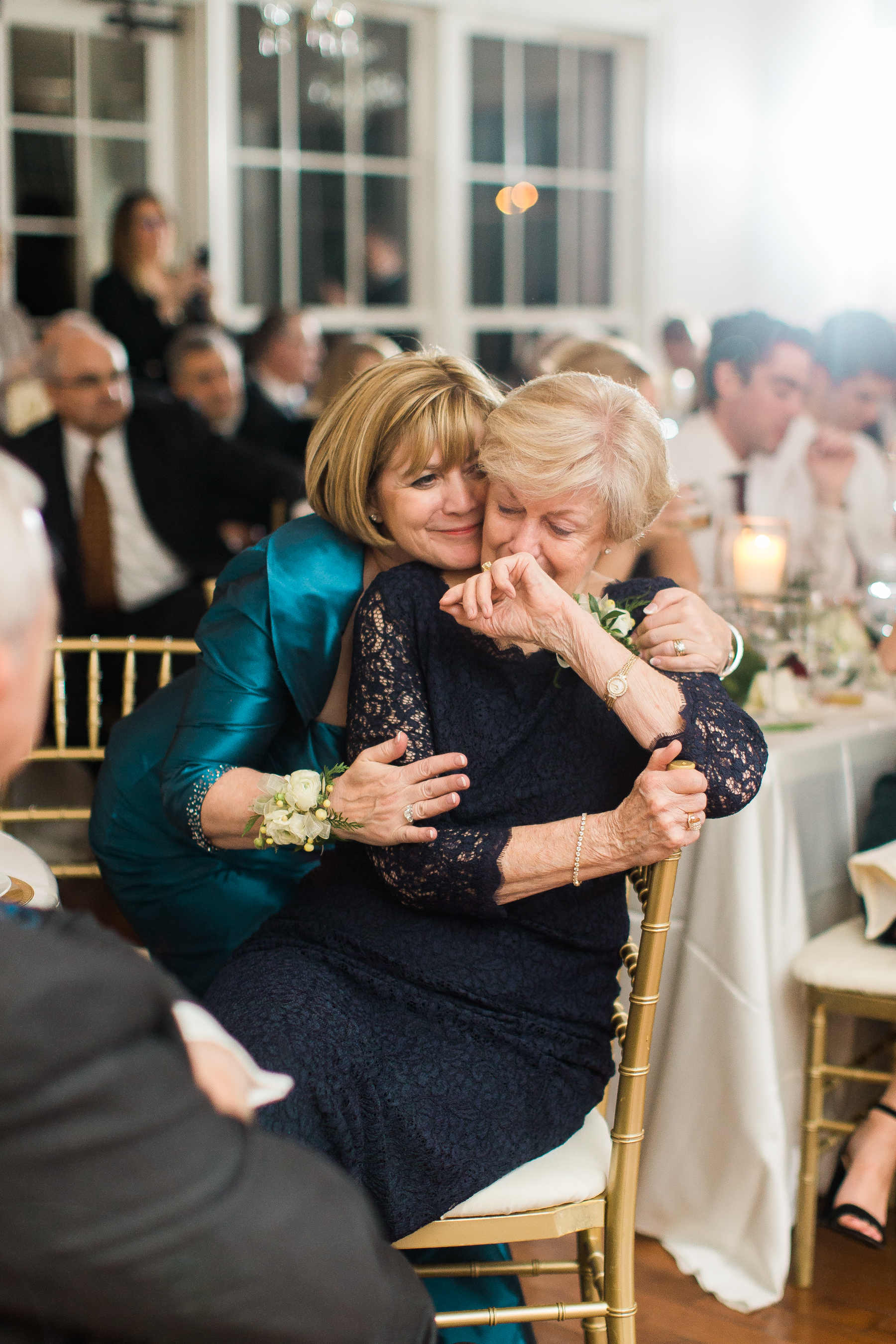 Mother and grandmother get emotional during wedding toasts.