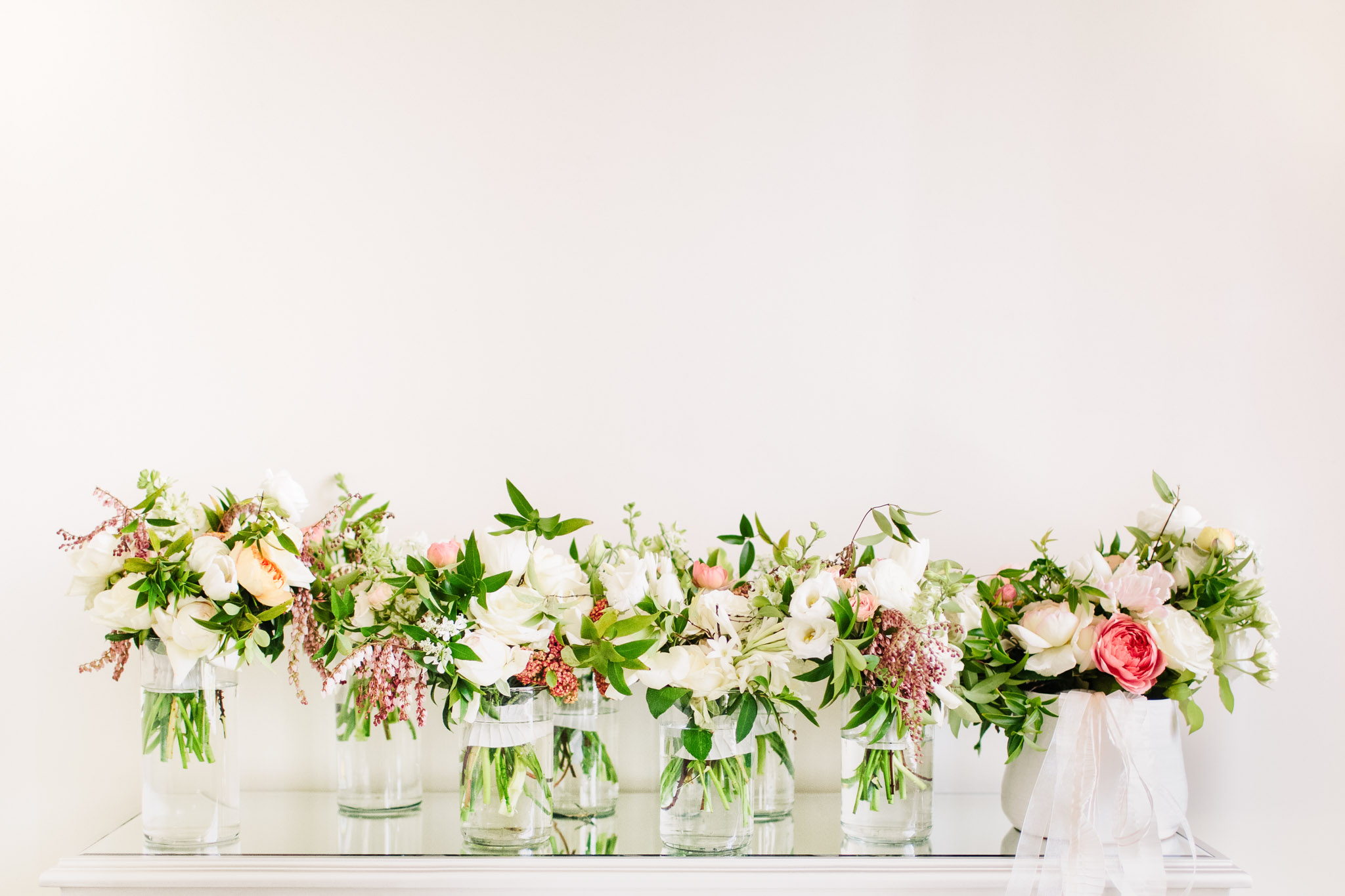 These stunning florals by Amy Osaba Events were perfect for Deborah's Summerour Studio wedding. Photo by Rebecca Cerasani, Summerour's premier wedding photographer.