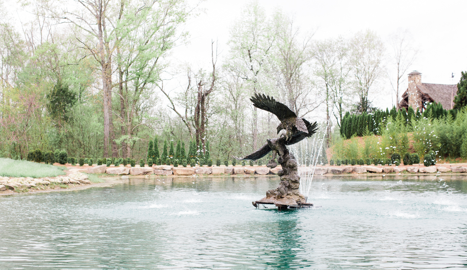 Eagles soar over this beautiful fountain at the entrance of 2400 on the river